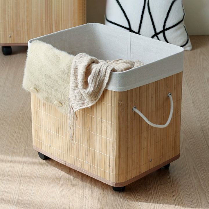 Stylish laundry container with practical lid and carrying handles Bowlift