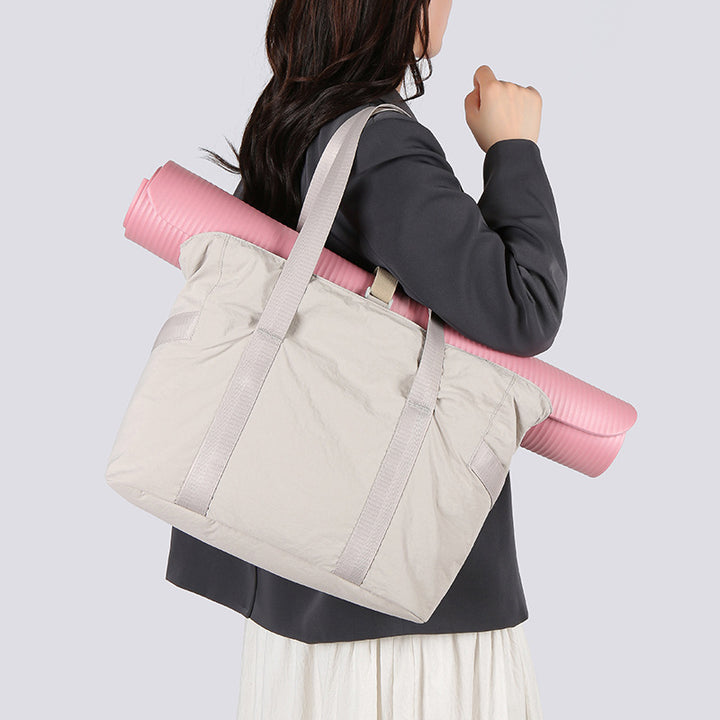 Stylish tote bag with spacious main compartment and reinforced handles Bowlift