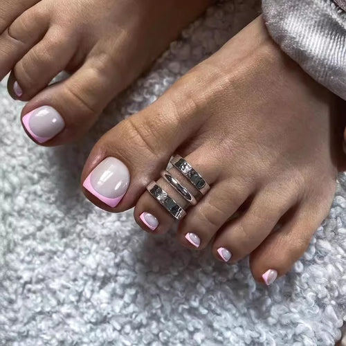 Nail art set with elegant French design and glitter accents Bowlift