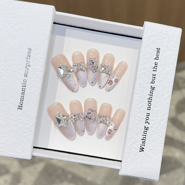 Romantic artificial nails with glitter decoration Bowlift