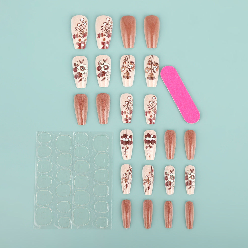 Artificial nails with filigree flower designs Bowlift