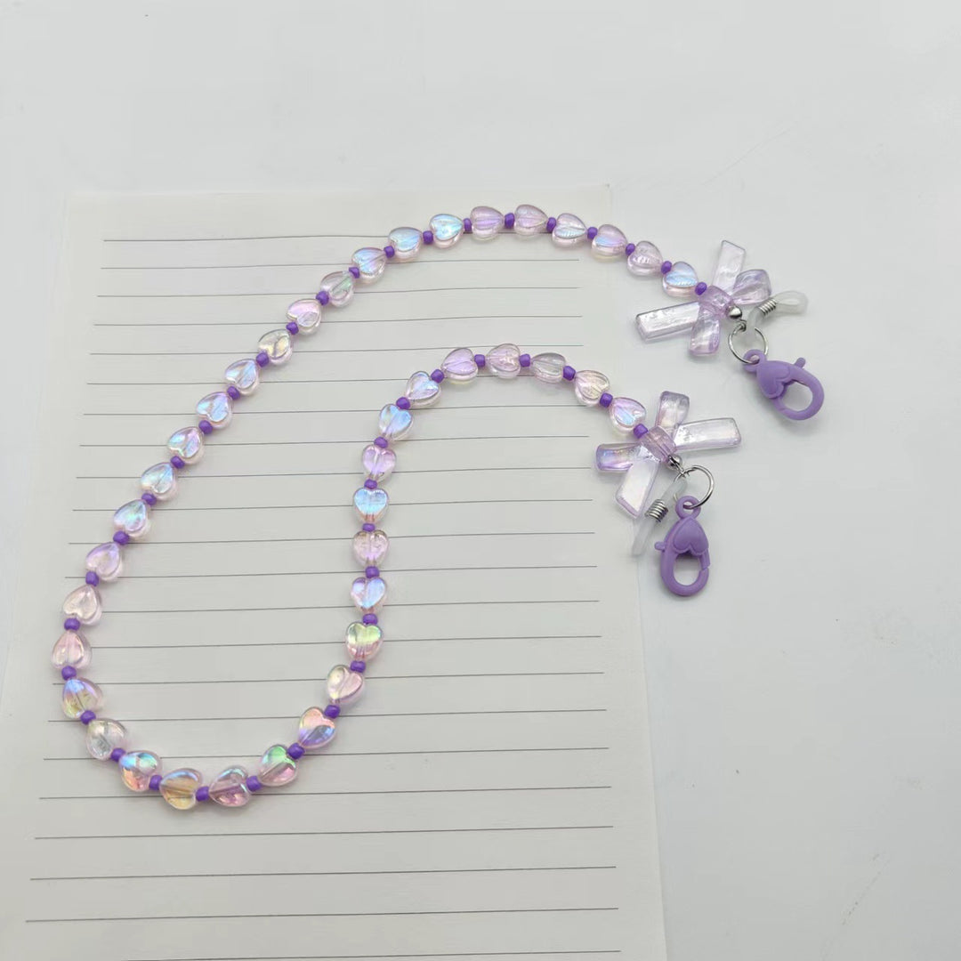 Fashionable glasses holder chain with heart and flower motifs Bowlift