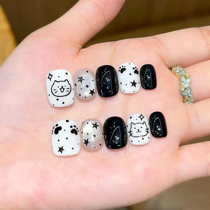 Artificial nails with cat and star design Bowlift