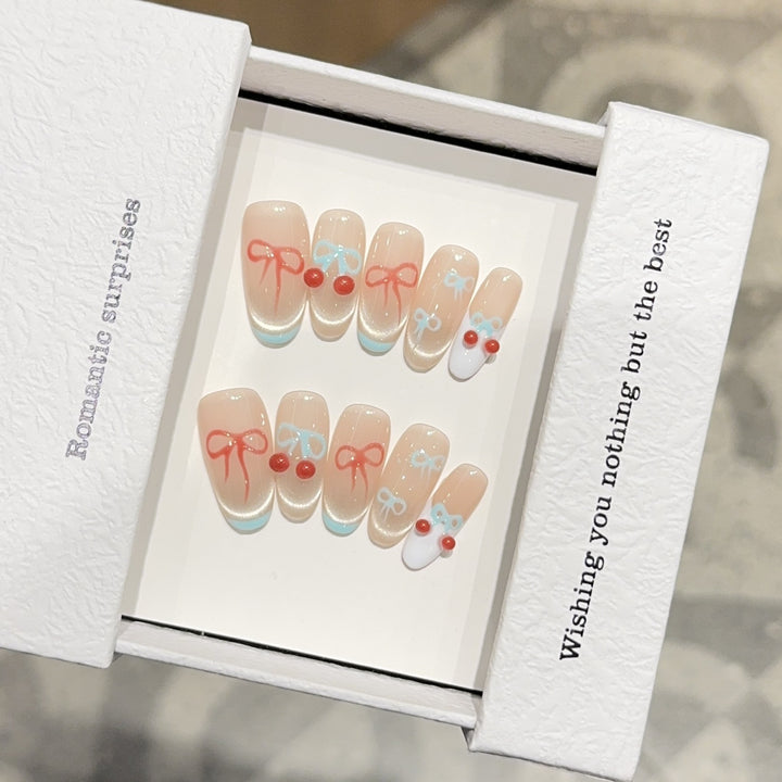 Artificial nail tips with romantic bow and cherry motifs Bowlift