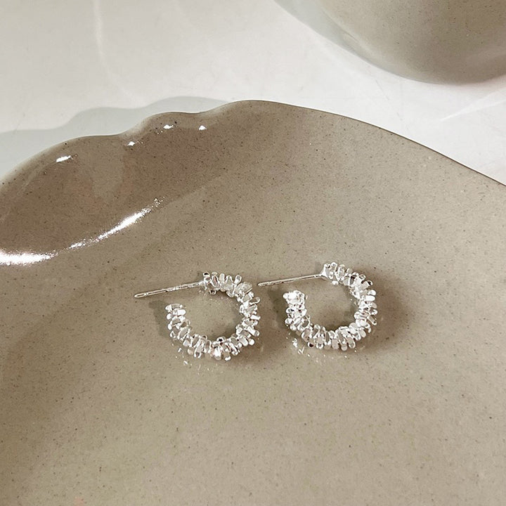 Sparkling hoops with sparkling details Bowlift