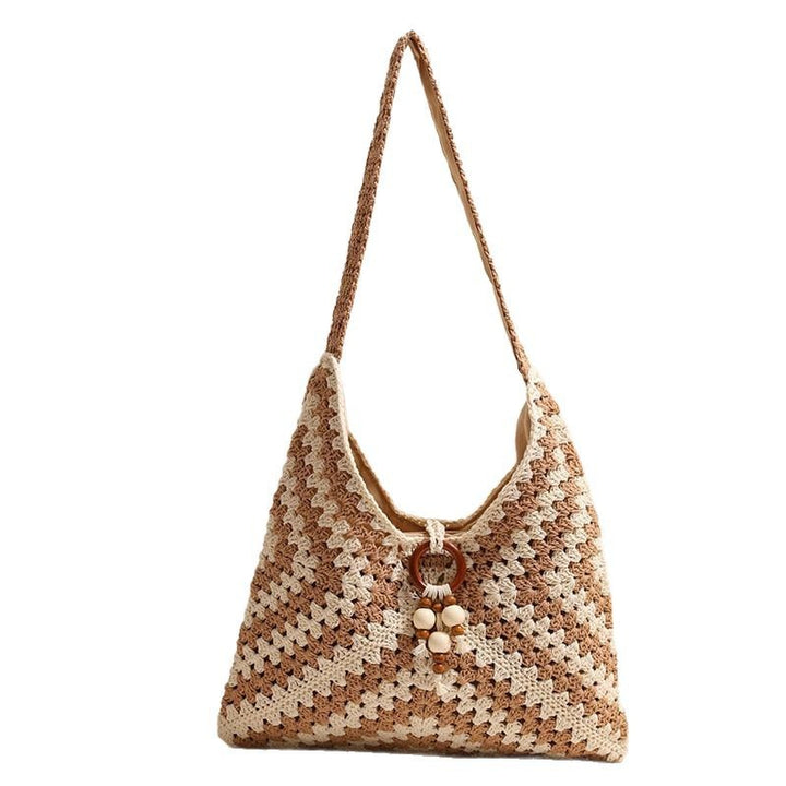 Handmade macrame shoulder bag with playful pendant Bowlift