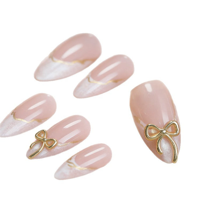 Elegant Stiletto Press-On Nails with Metallic Accents Bowlift