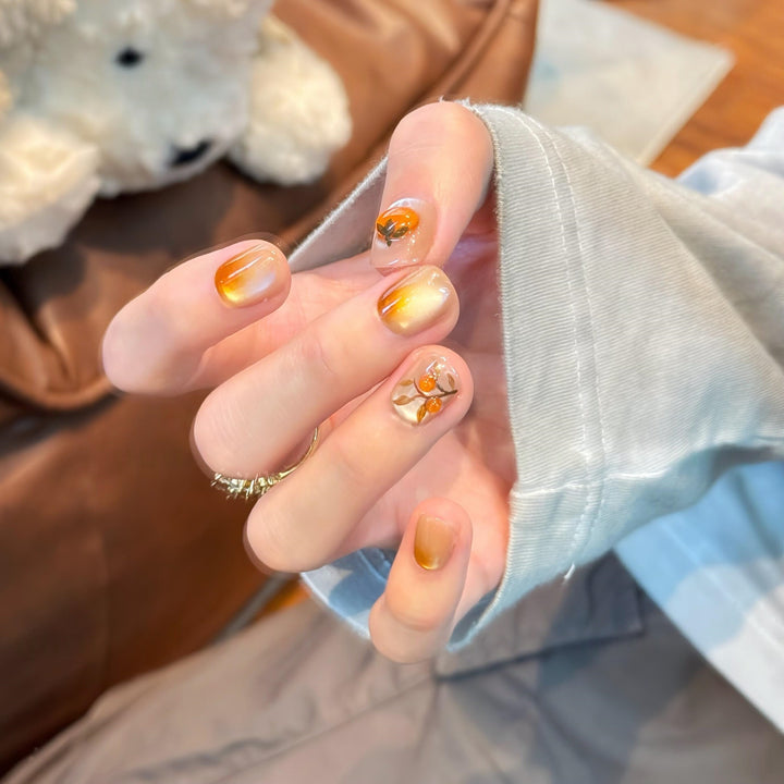 Artificial nails in elegant ombre look with floral accent Bowlift