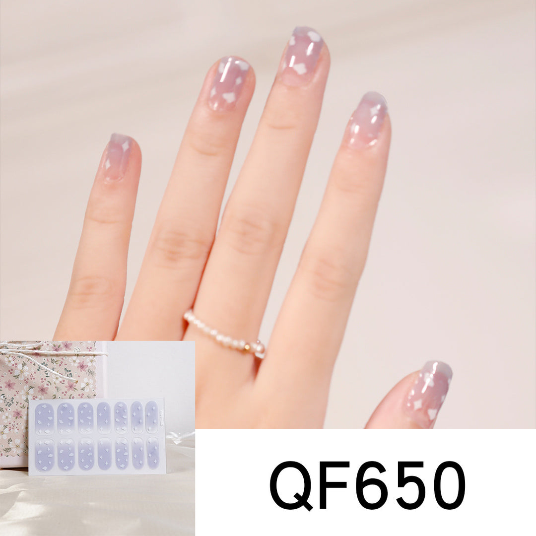 Artificial nail art with heart-shaped designs and soft color gradients Bowlift