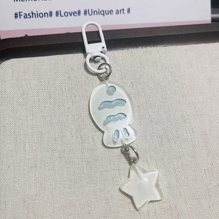 Playful keychain with fish and star motif Bowlift