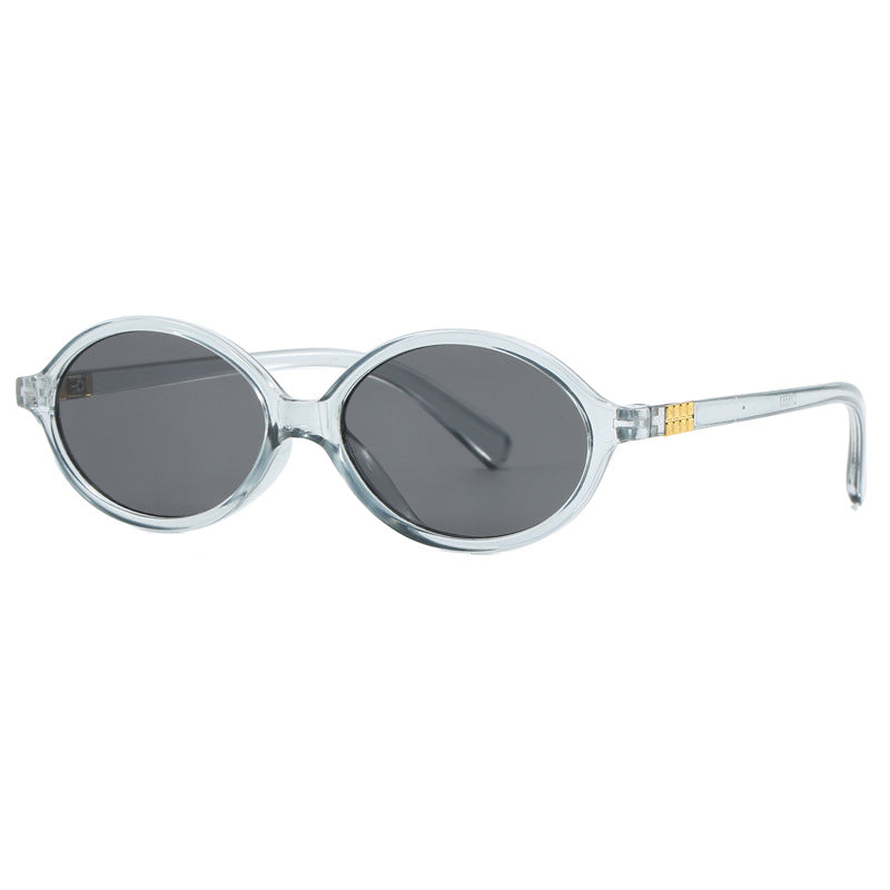 Women's fashionable sunglasses with oval frame and golden accents Bowlift