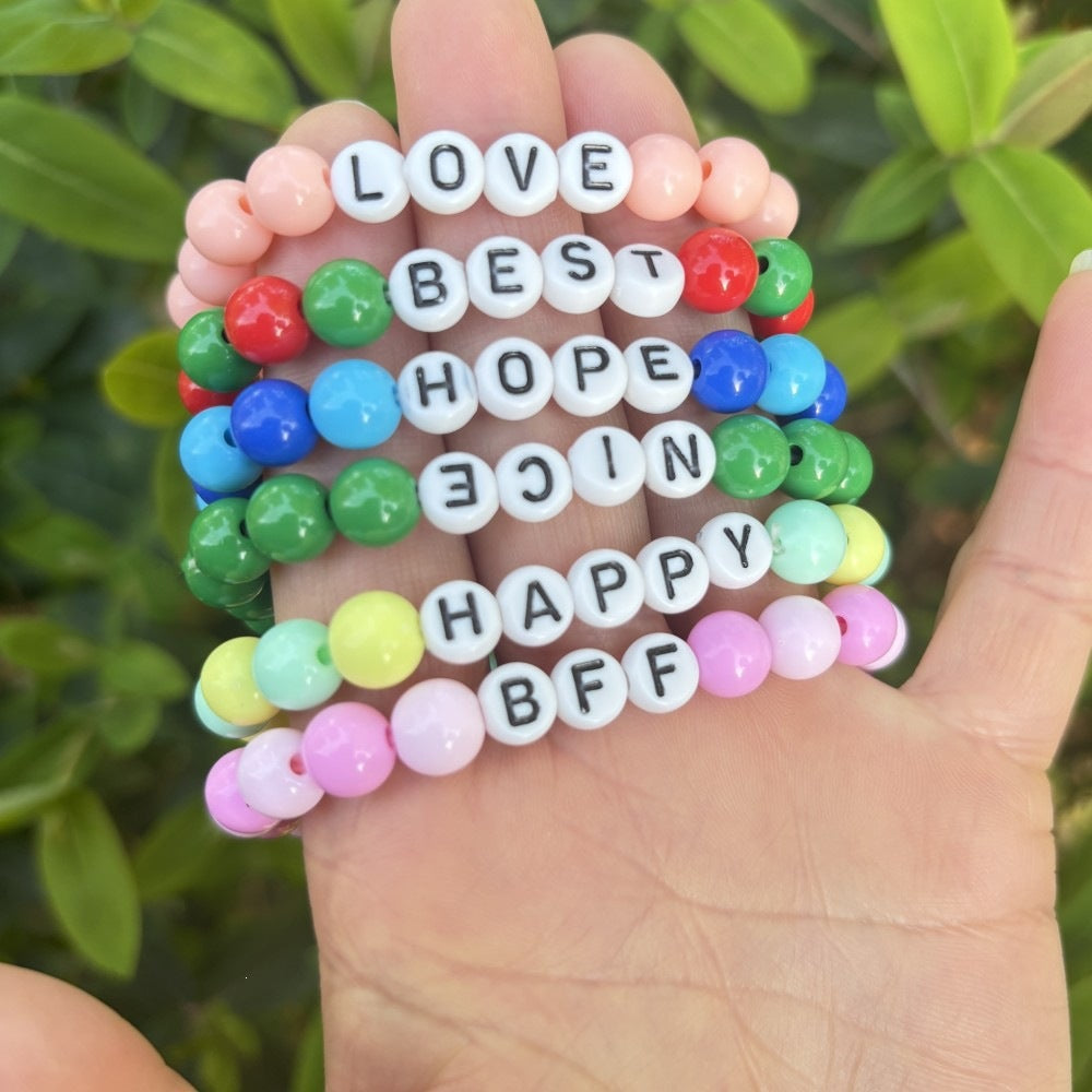 Friendship bracelet made of pastel beads Bowlift