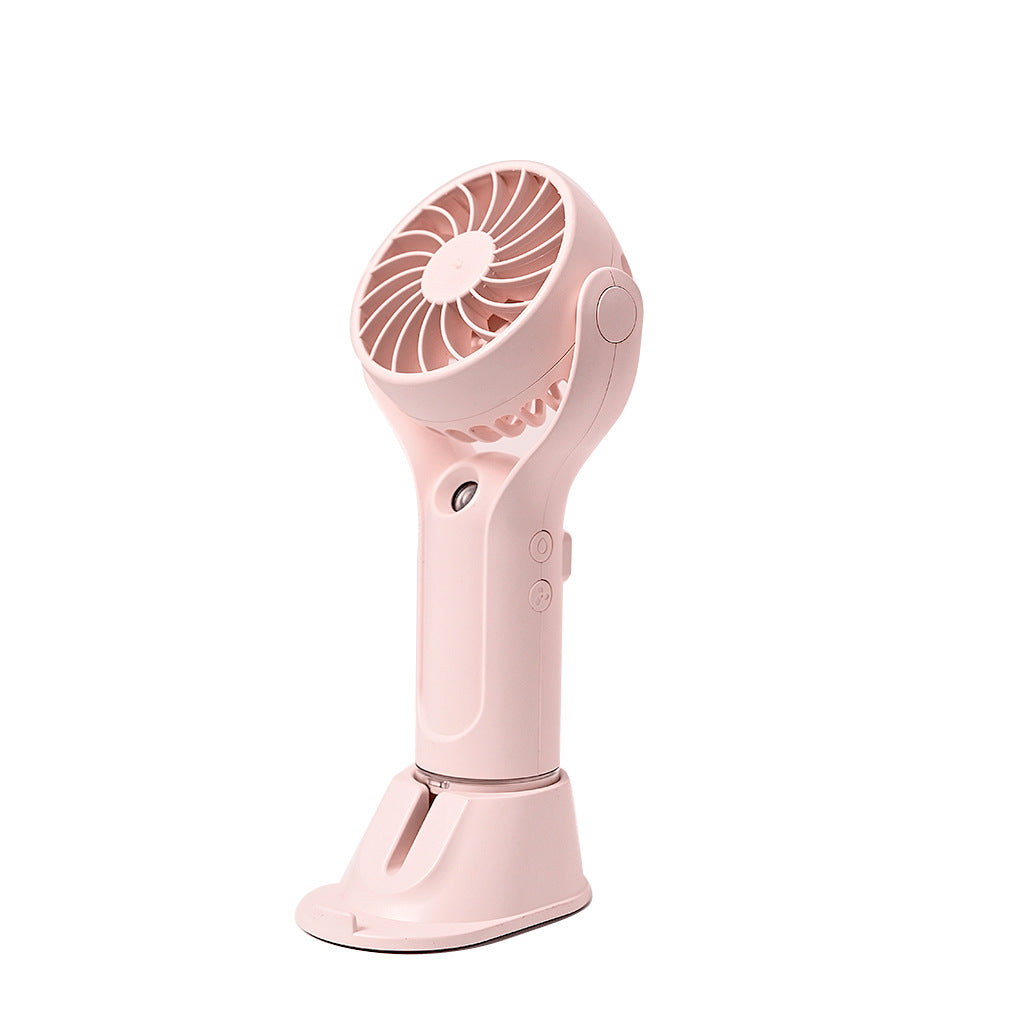 Unisex portable handheld fan with tiltable head, foldable stand and USB charging station Bowlift