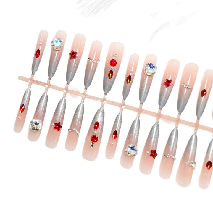 Artificial nails with glamorous glitter design and 3D applications Bowlift