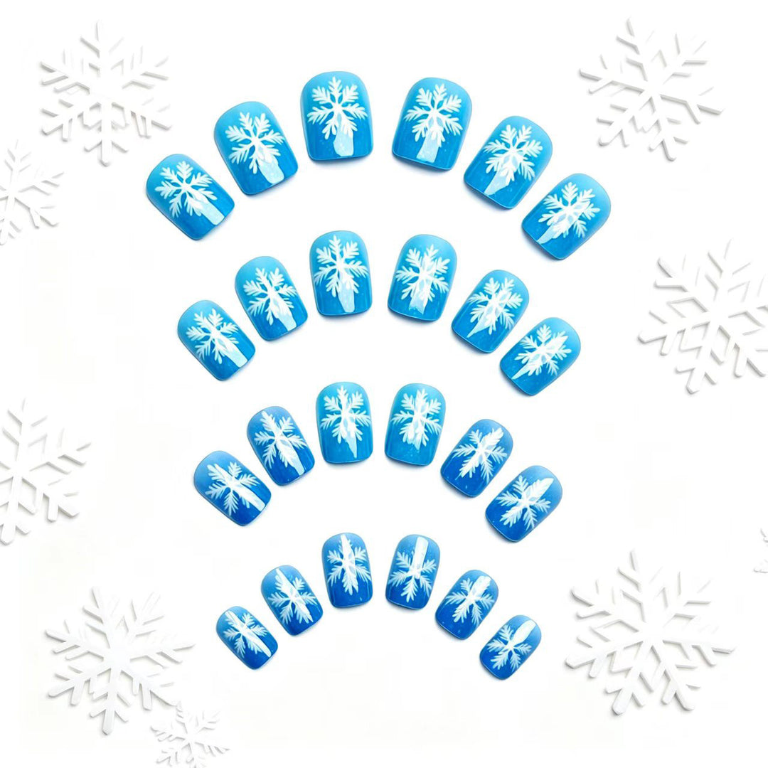 Artificial nails with sparkling winter flake design Bowlift