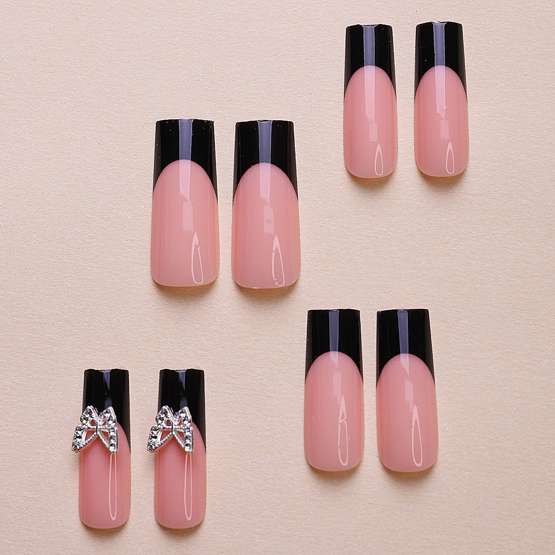 Acrylic nail set with elegant butterfly accents Bowlift