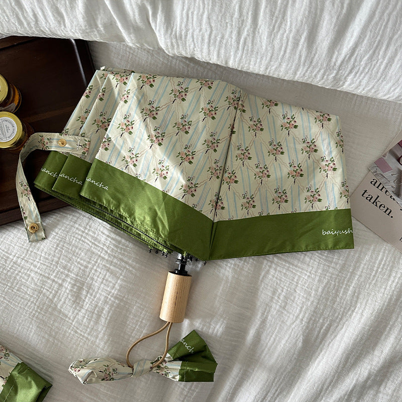 Ladies elegant folding umbrella with floral design Bowlift