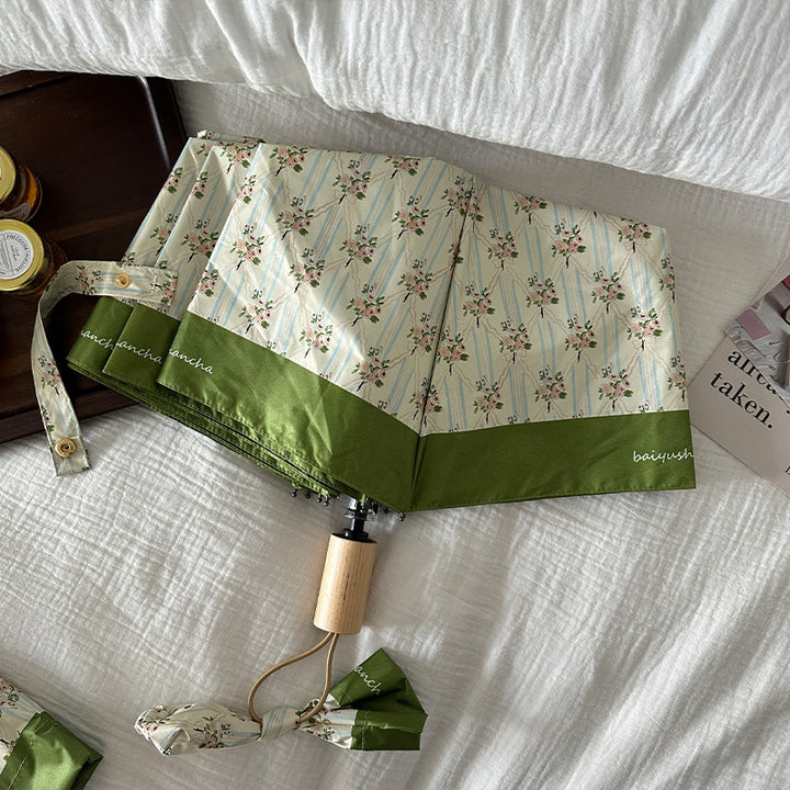 Ladies elegant folding umbrella with floral design Bowlift