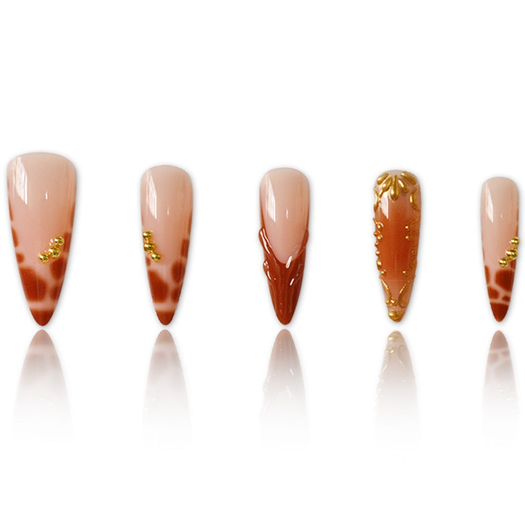 Elegant Stiletto Nail Art Enhancements with Artistic Details Bowlift