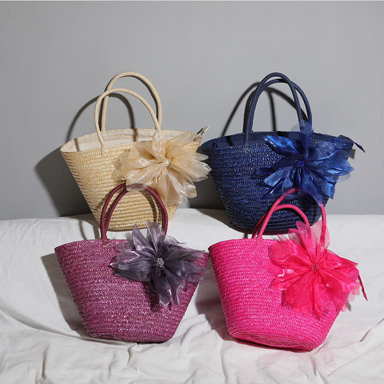 Stylish basket bag with eye-catching flower detail Bowlift