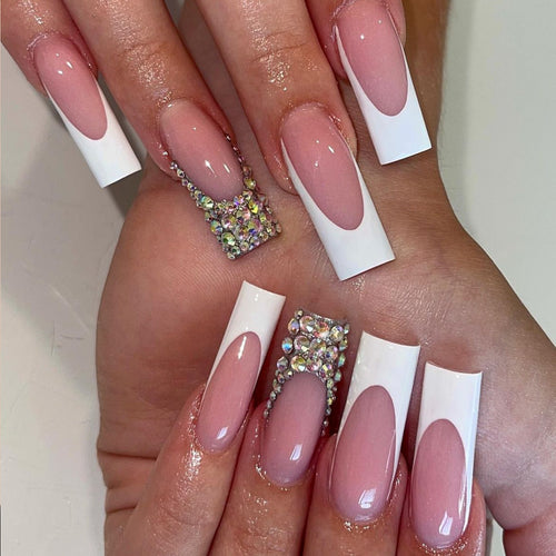 Acrylic nail set with filigree accents and glitter embellishments Bowlift