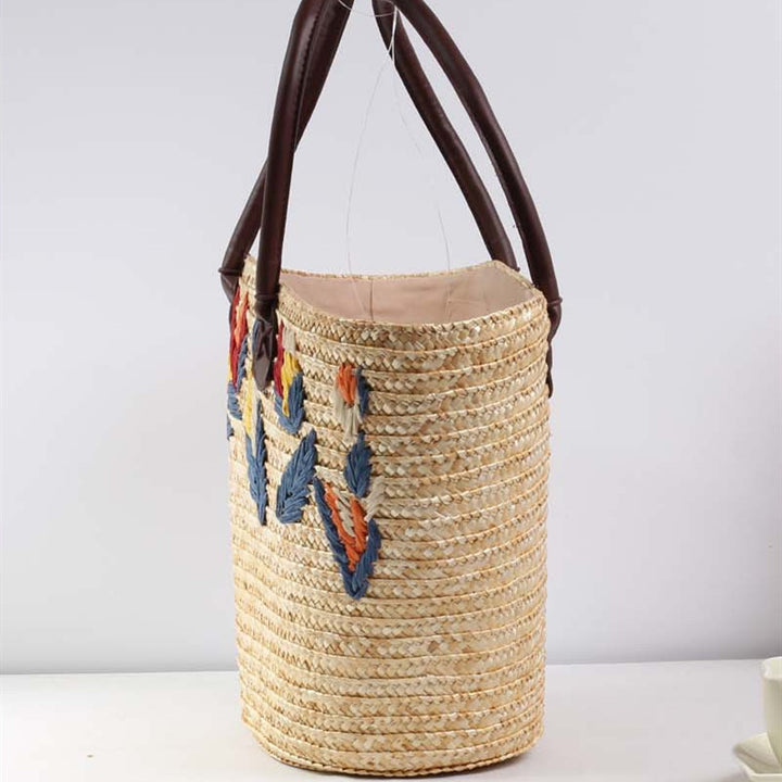 Braided beach bag with colorful embroidery pattern Bowlift
