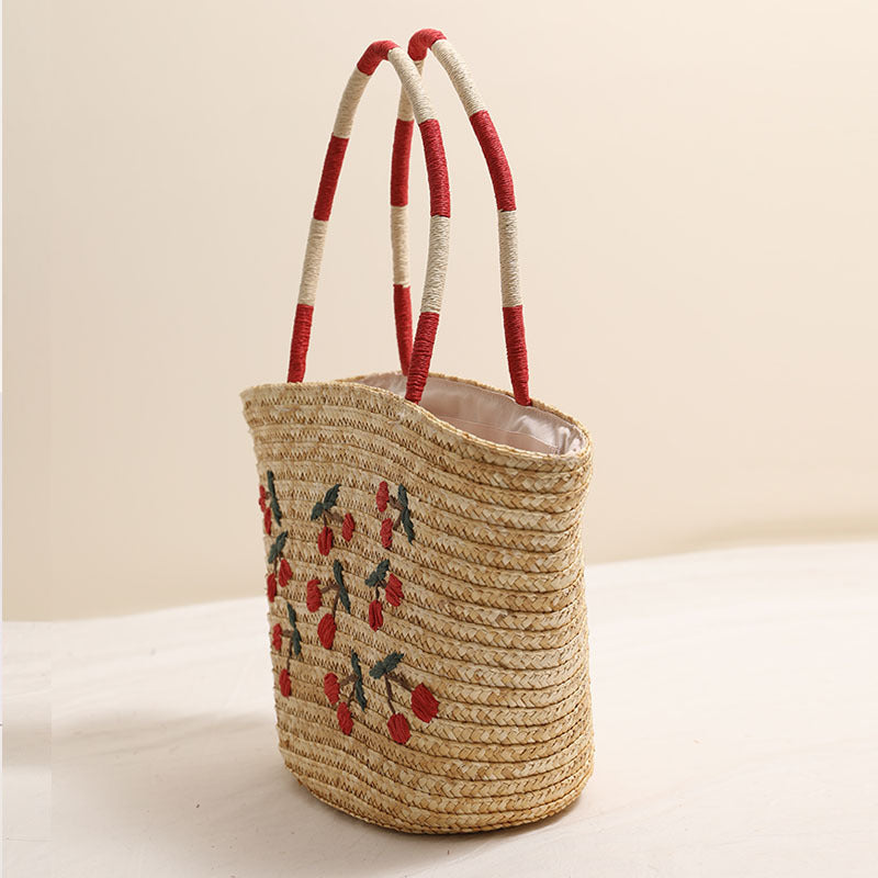 Handcrafted basket bag with vibrant floral embroidery design Bowlift