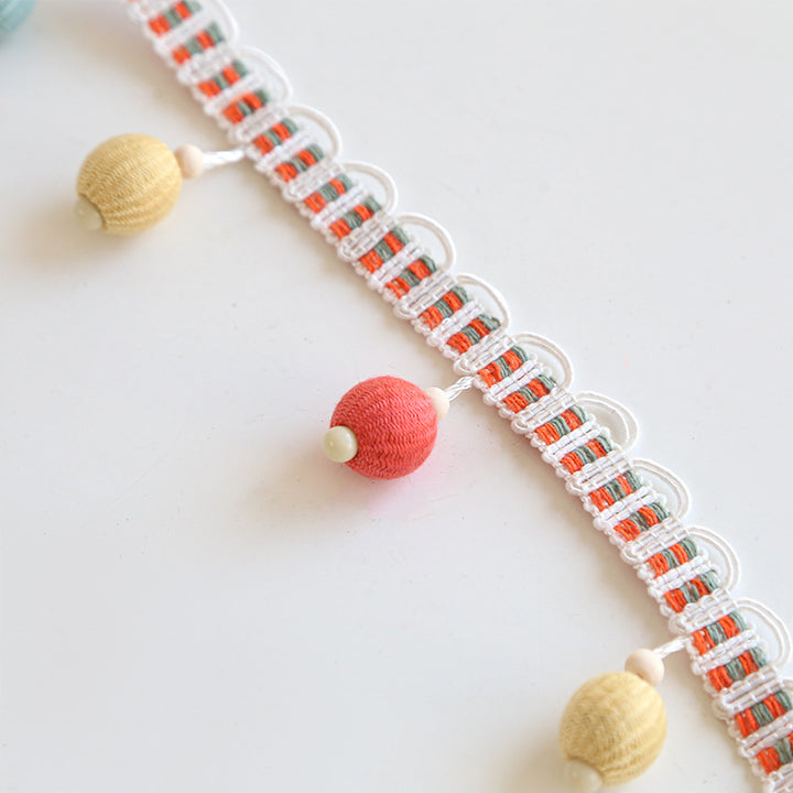 Decorative fringe trim with colorful tassels Bowlift