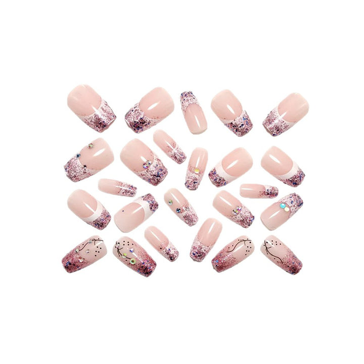 Glamorous artificial nails with glitter and rhinestone embellishments Bowlift