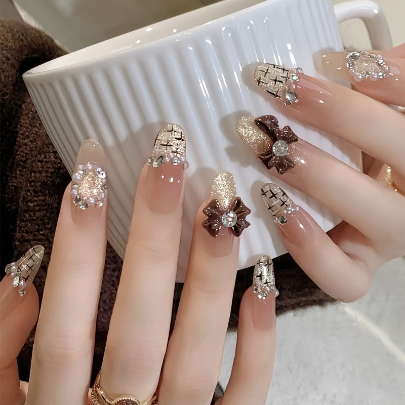 Elegant Press-On Nail Tips with Gold Accents Bowlift