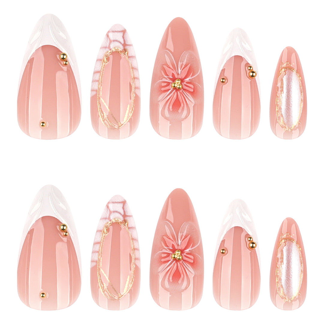 Artful nail art with floral and golden accents Bowlift