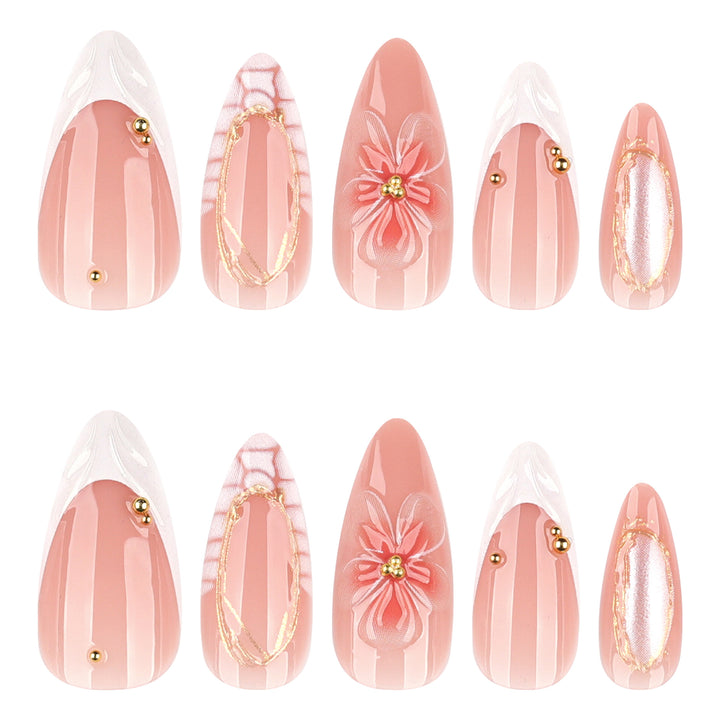 Artful nail art with floral and golden accents Bowlift
