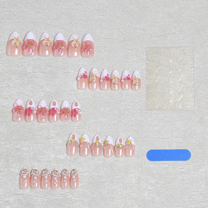 Artificial nail set with floral and maritime designs Bowlift