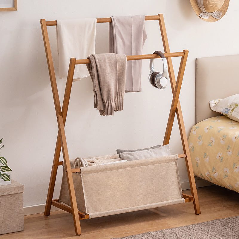 Designer laundry rack with foldable frame and practical shelf Bowlift