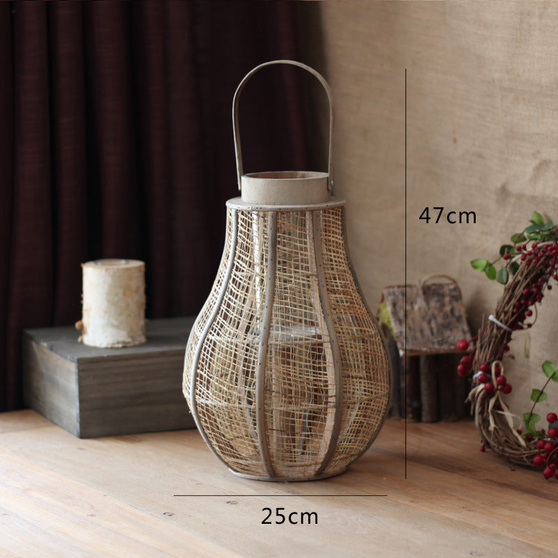 Rustic lantern made of braided natural material Bowlift