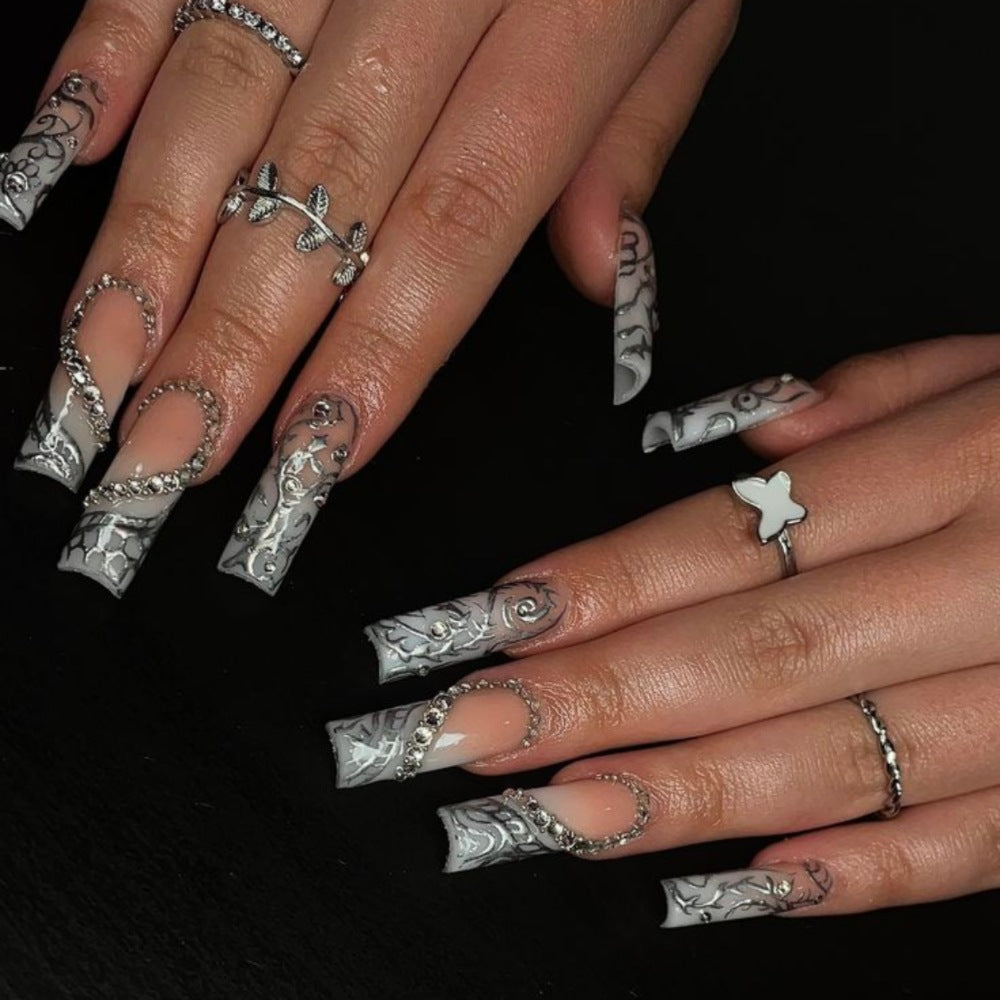 Artificial nails with elegant 3D pattern and radiant rhinestone decorations Bowlift