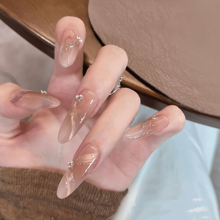 Artificial nails with elegant rhinestone accents Bowlift