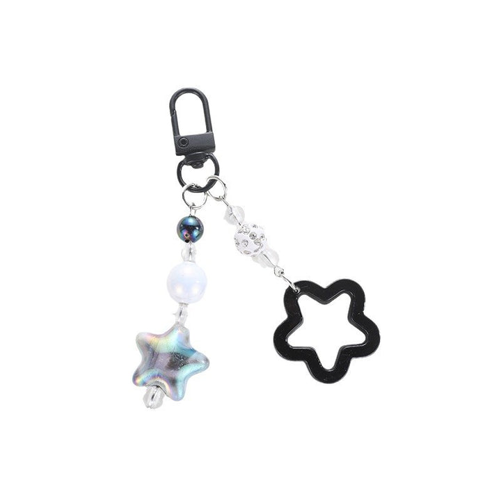 Playful keychain with floral and star motif Bowlift