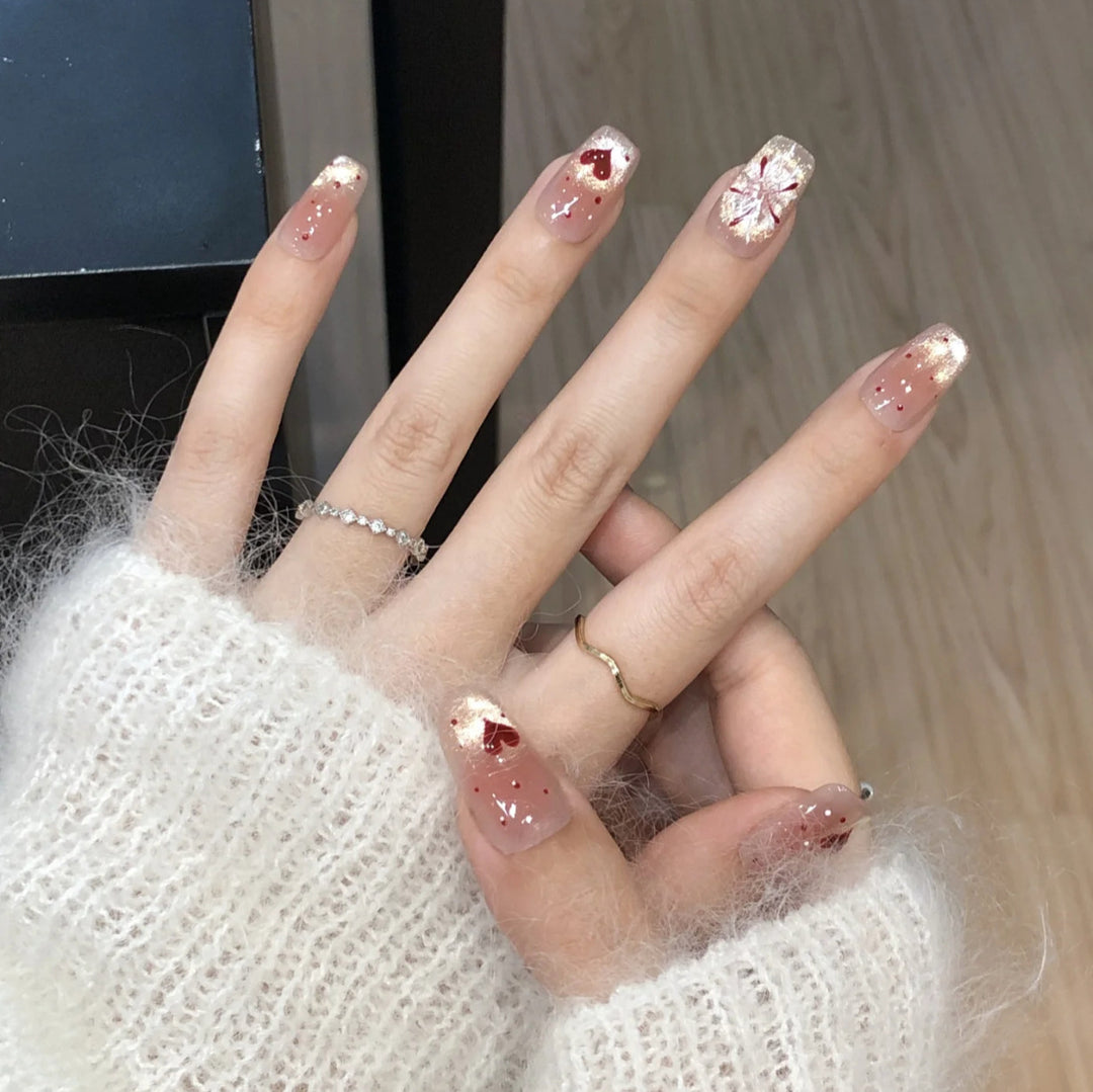 Artistic Press-On Nail Set with Heart and Design Accents Bowlift