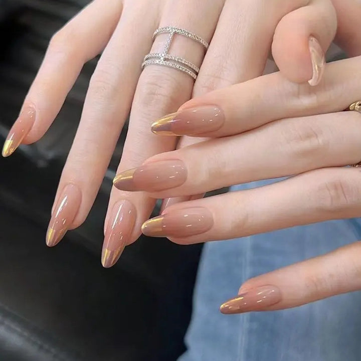 Nail art with elegant gradient and metallic accents Bowlift