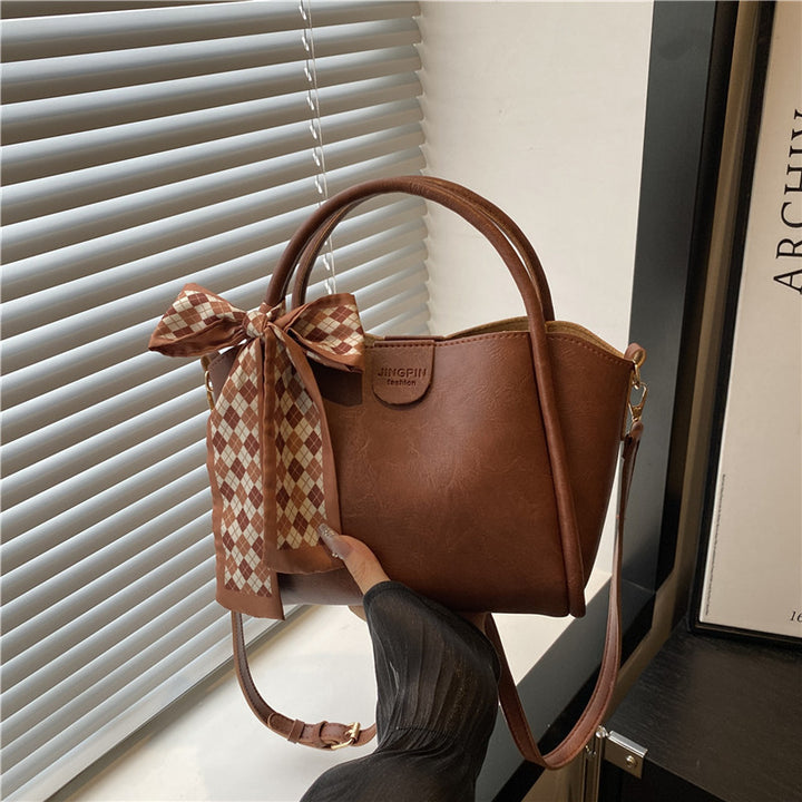 Elegant Bow Accent Handbag Bowlift
