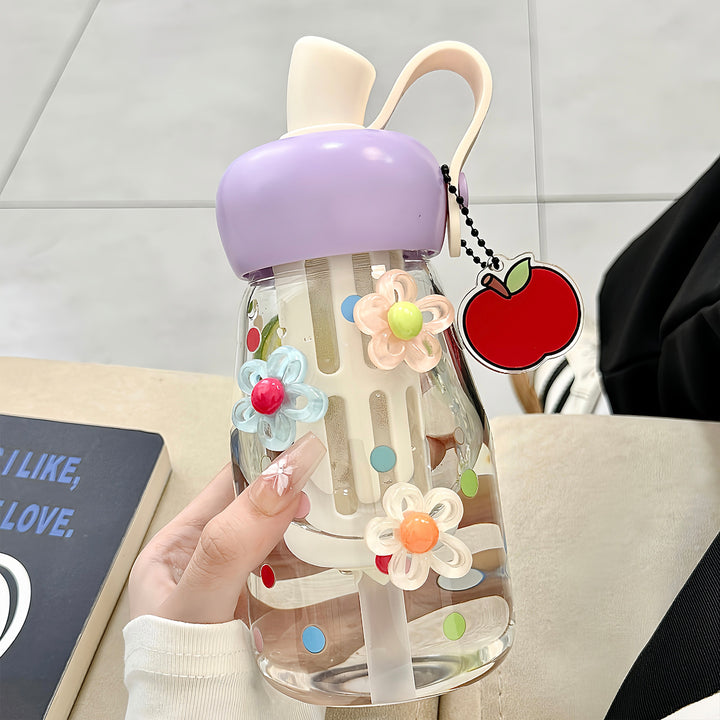 Women's water bottle with integrated fruit filter and practical carrying handle Bowlift