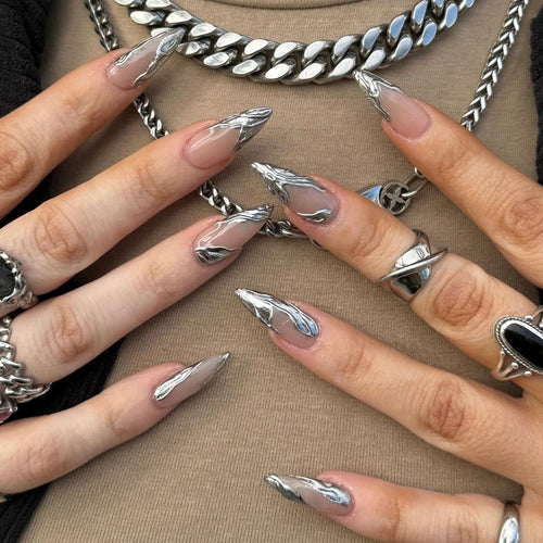 Artistic Acrylic Stiletto Nails with Elegant Metallic Decorations Bowlift