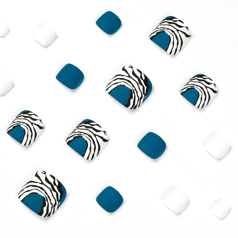 Artful toenail design in modern zebra pattern Bowlift