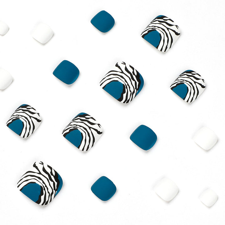 Artful toenail design in modern zebra pattern Bowlift