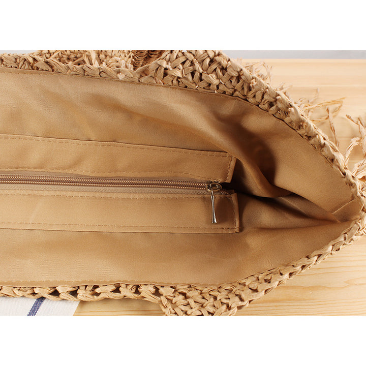 Designer straw bag with fringe decoration Bowlift