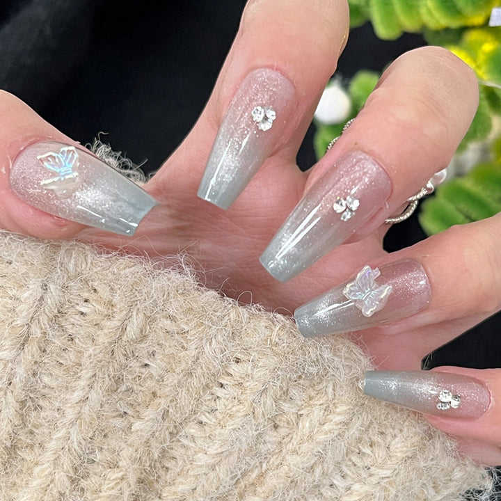 Glossy Nail Art Set with Sparkling Glitter Accents Bowlift