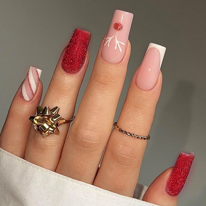 Artificial nail set with sparkling glitter and festive accents Bowlift