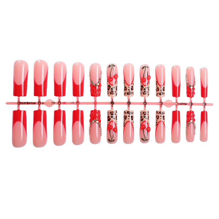 Artificial nail set with glamorous flower and glitter accents Bowlift