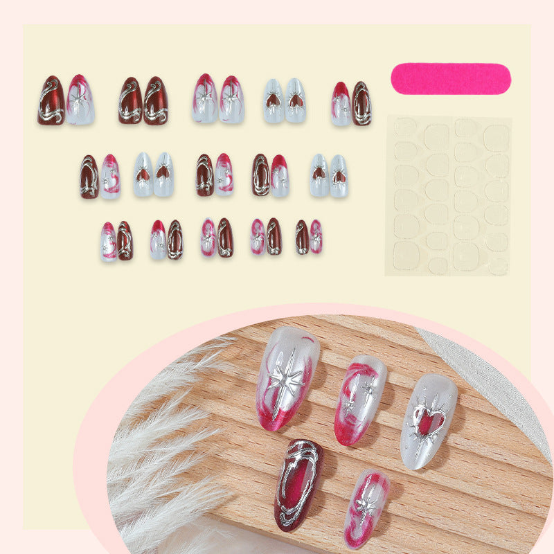 Artificial nail set with romantic decorations and glitter Bowlift